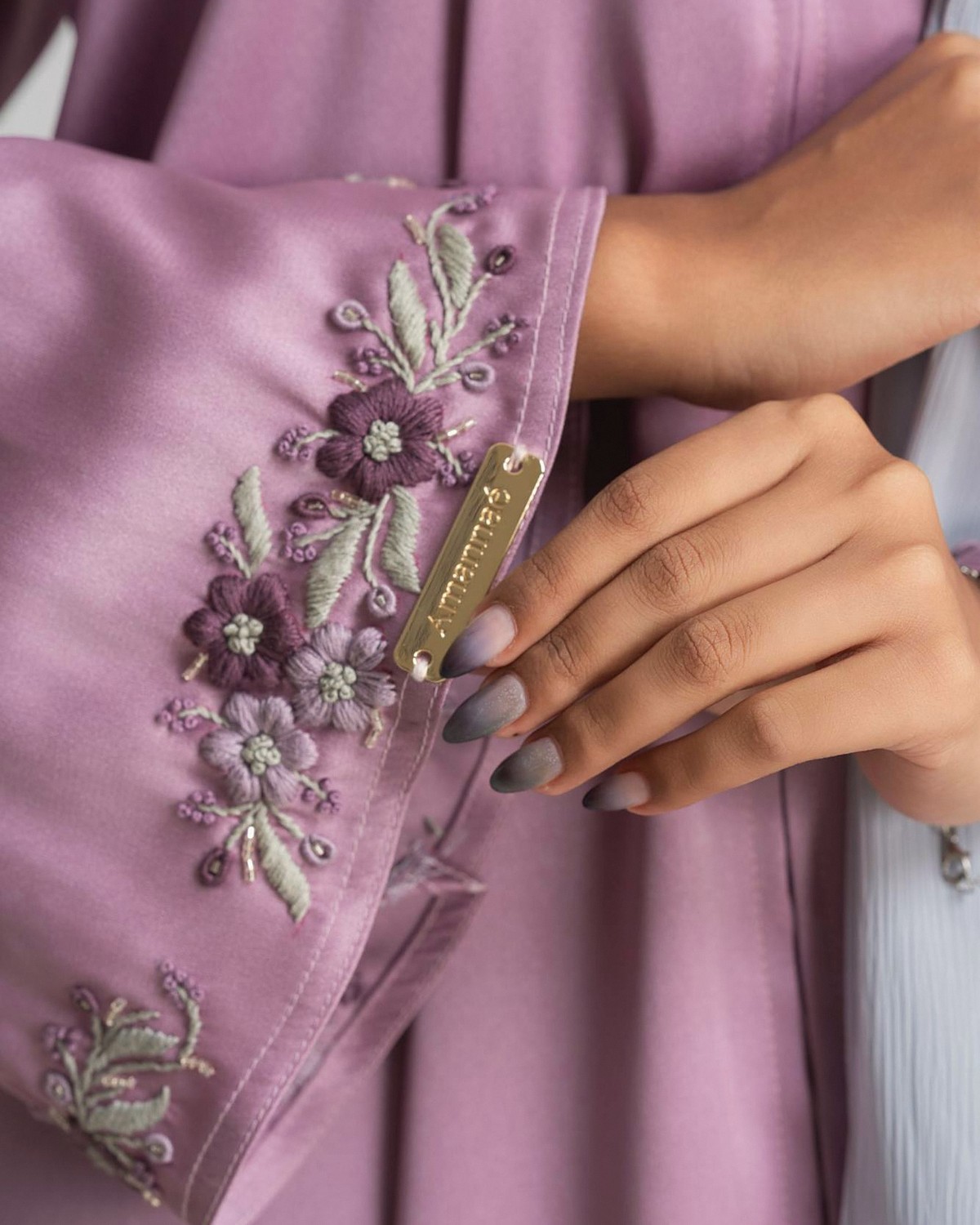 Plum and sage blossoms embroidered on the mauve Lavender abaya cuff